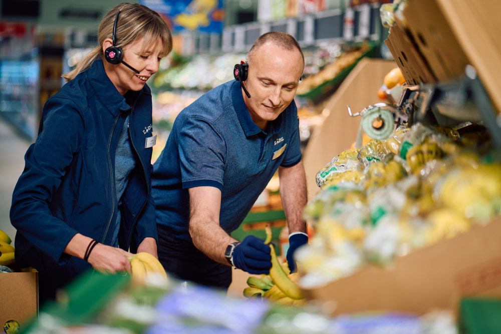 Lidl staff and fruit